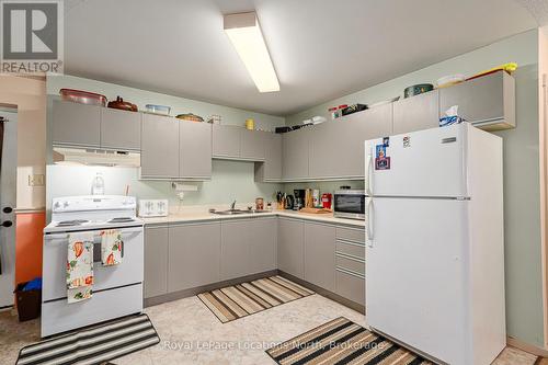 1 - 891 River Road W, Wasaga Beach, ON - Indoor Photo Showing Kitchen With Double Sink