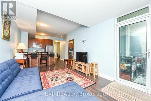 208 - 65 Yorkland Boulevard, Brampton, ON - Indoor Photo Showing Living Room