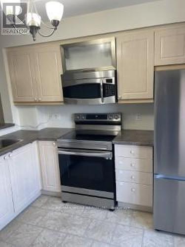 310 - 4450 Fairview Street S, Burlington, ON - Indoor Photo Showing Kitchen