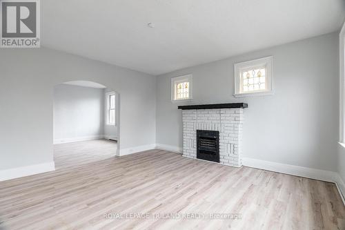 7 - 425 Mckenzie Avenue, London, ON - Indoor Photo Showing Living Room With Fireplace