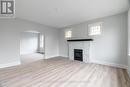 7 - 425 Mckenzie Avenue, London, ON  - Indoor Photo Showing Living Room With Fireplace 