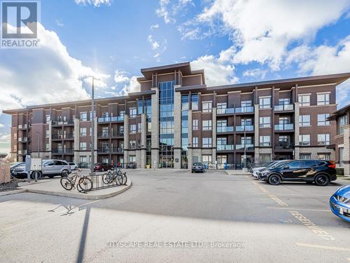 113 - 5020 Corporate Drive, Burlington, ON - Outdoor With Balcony With Facade