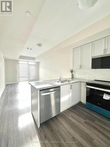 113 - 1577 Rose Way, Milton, ON - Indoor Photo Showing Kitchen With Double Sink With Upgraded Kitchen