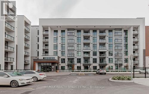 602 - 480 Gordon Krantz Avenue, Milton, ON - Outdoor With Balcony With Facade