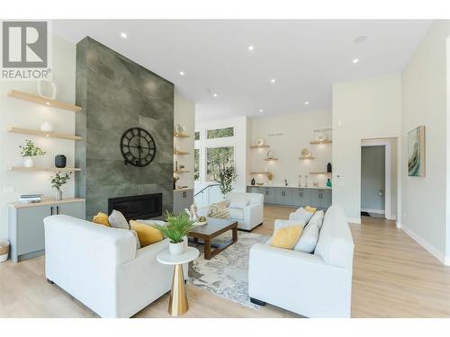 883 Loseth Drive, Kelowna, BC - Indoor Photo Showing Living Room With Fireplace