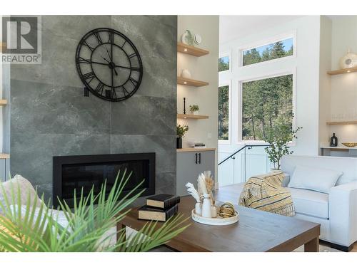 883 Loseth Drive, Kelowna, BC - Indoor Photo Showing Living Room With Fireplace