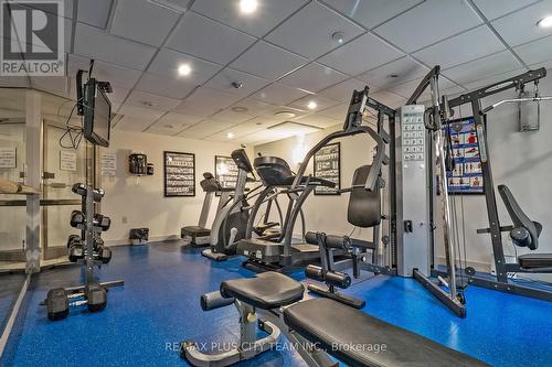 1408 - 25 Fairview Road W, Mississauga, ON - Indoor Photo Showing Gym Room