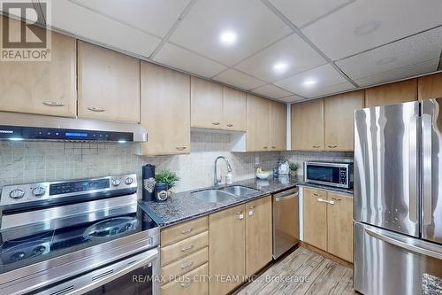 1408 - 25 Fairview Road W, Mississauga, ON - Indoor Photo Showing Kitchen With Double Sink