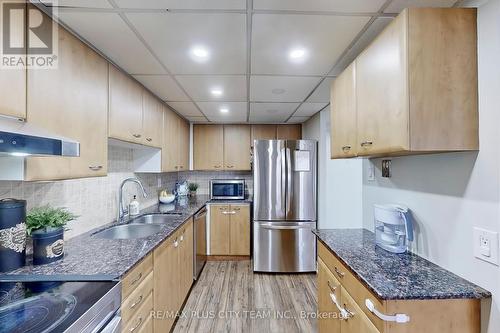 1408 - 25 Fairview Road W, Mississauga, ON - Indoor Photo Showing Kitchen With Double Sink