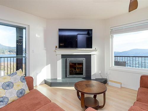 214-1991 Kaltasin Rd, Sooke, BC - Indoor Photo Showing Living Room With Fireplace