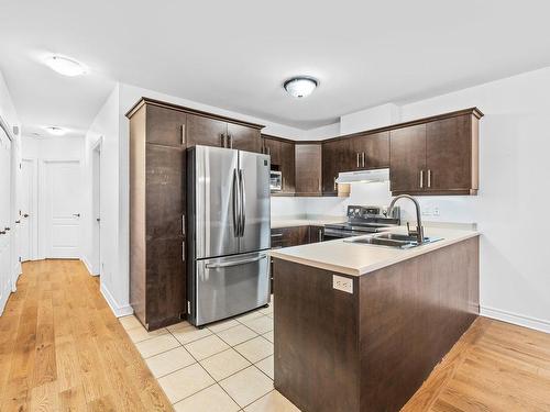 Kitchen - 102-3460 Boul. Pie-Ix, Laval (Duvernay), QC - Indoor Photo Showing Kitchen With Double Sink