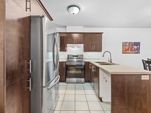 Kitchen - 102-3460 Boul. Pie-Ix, Laval (Duvernay), QC - Indoor Photo Showing Kitchen With Double Sink