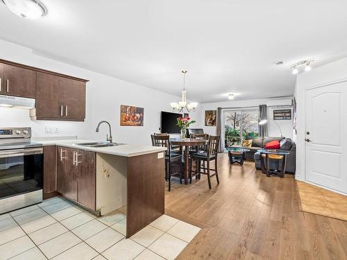 Overall view - 102-3460 Boul. Pie-Ix, Laval (Duvernay), QC - Indoor Photo Showing Kitchen With Double Sink