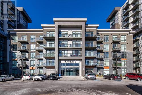 702 - 450 Dundas Street E, Hamilton, ON - Outdoor With Balcony With Facade