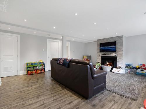 Family room - 2535 Rue Badeaux, Montréal (Saint-Laurent), QC - Indoor Photo Showing Living Room With Fireplace