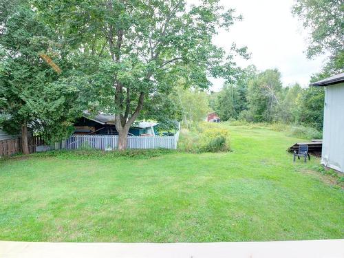 Cour - 305 Rue Josée, Sainte-Sophie, QC - Outdoor With Backyard