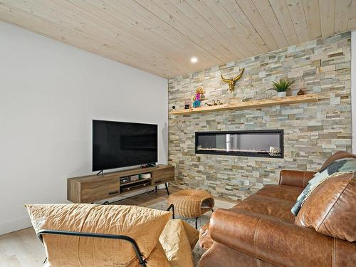 Living room - 315 Ch. De L'Aventure, Mont-Tremblant, QC - Indoor Photo Showing Living Room With Fireplace