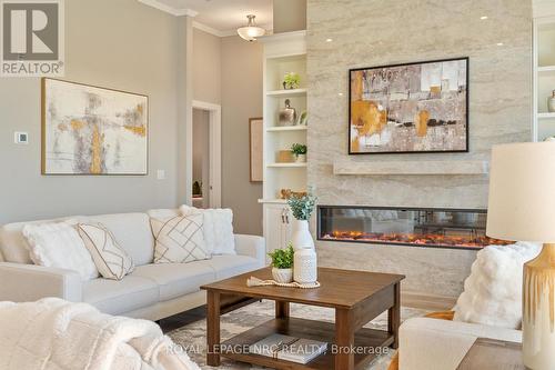 604 - 77 Yates Street, St. Catharines (Downtown), ON - Indoor Photo Showing Living Room With Fireplace