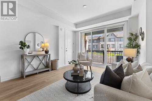 302 - 160 Densmore Road, Cobourg, ON - Indoor Photo Showing Living Room