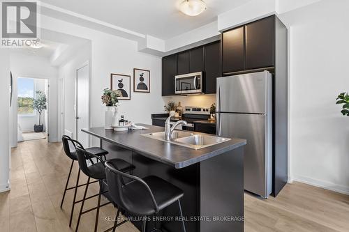 302 - 160 Densmore Road, Cobourg, ON - Indoor Photo Showing Kitchen With Stainless Steel Kitchen With Double Sink