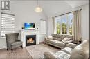 3205 Mosley Street, Wasaga Beach, ON  - Indoor Photo Showing Living Room With Fireplace 