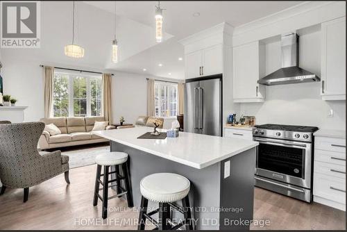 3205 Mosley Street, Wasaga Beach, ON - Indoor Photo Showing Kitchen With Upgraded Kitchen