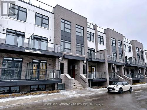 112 - 1577 Rose Way, Milton, ON - Outdoor With Balcony With Facade