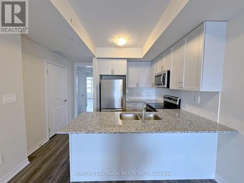 112 - 1577 Rose Way, Milton, ON - Indoor Photo Showing Kitchen With Upgraded Kitchen