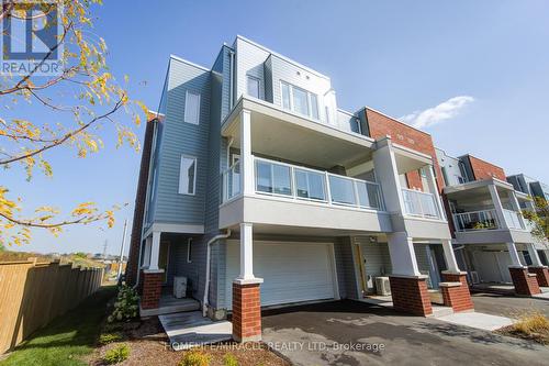 70 Progress Avenue, Kitchener, ON - Outdoor With Balcony With Facade