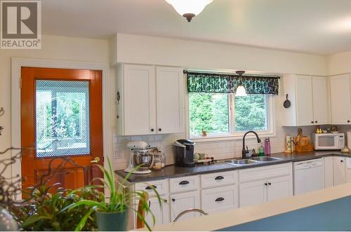 4438 Queensway Drive, Terrace, BC - Indoor Photo Showing Kitchen With Double Sink