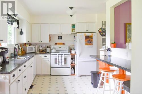 4438 Queensway Drive, Terrace, BC - Indoor Photo Showing Kitchen With Double Sink