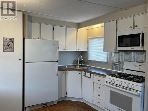 20 457 Vanderview Drive, Vanderhoof, BC - Indoor Photo Showing Kitchen With Double Sink