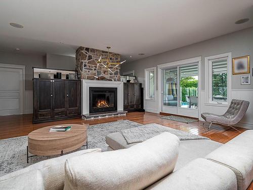 Living room - 138 Rue Du Havre, Terrebonne (Lachenaie), QC - Indoor Photo Showing Living Room With Fireplace