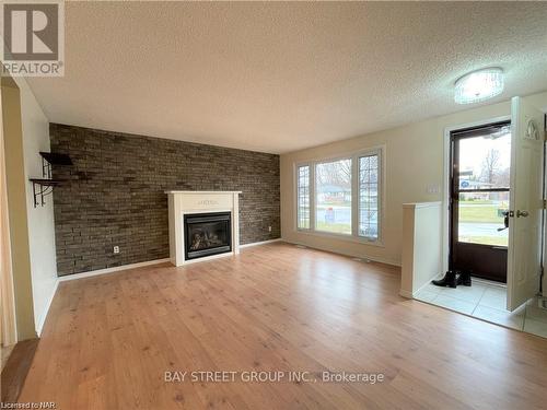 Upper - 75 Bula Drive, St. Catharines (443 - Lakeport), ON - Indoor Photo Showing Living Room With Fireplace