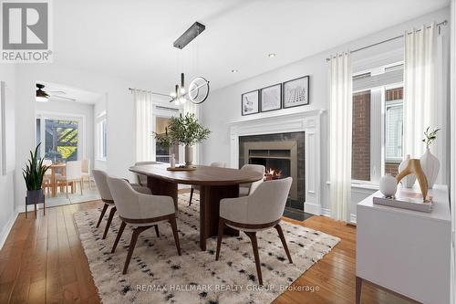 124 Sai Crescent, Ottawa, ON - Indoor Photo Showing Dining Room With Fireplace