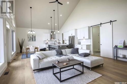 323 Woolf Bay, Saskatoon, SK - Indoor Photo Showing Living Room