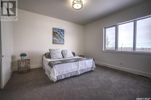 323 Woolf Bay, Saskatoon, SK - Indoor Photo Showing Bedroom