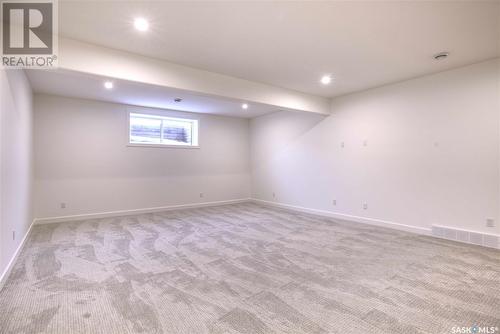 323 Woolf Bay, Saskatoon, SK - Indoor Photo Showing Basement