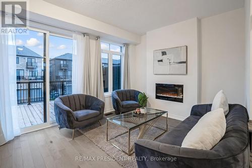 408 Tim Manley Avenue, Caledon, ON - Indoor Photo Showing Living Room With Fireplace