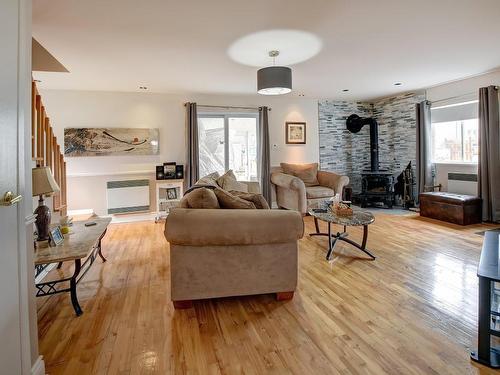 Family room - 2325 Mtée Masson, Laval (Duvernay), QC - Indoor Photo Showing Living Room With Fireplace