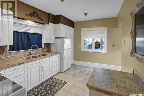 915 1St Avenue Ne, Moose Jaw, SK - Indoor Photo Showing Kitchen With Double Sink