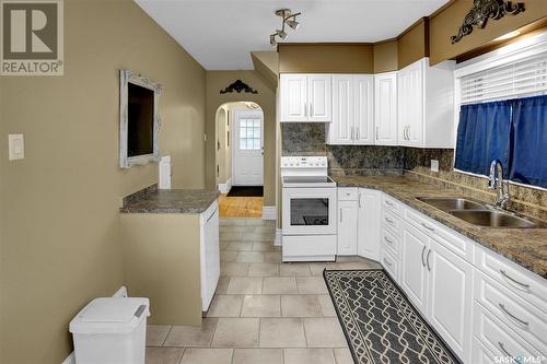 915 1St Avenue Ne, Moose Jaw, SK - Indoor Photo Showing Kitchen With Double Sink