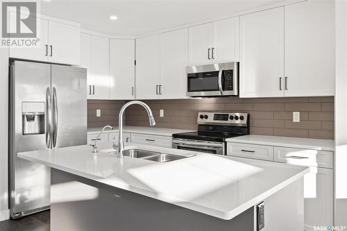 352 Brighton Gate, Saskatoon, SK - Indoor Photo Showing Kitchen With Double Sink With Upgraded Kitchen