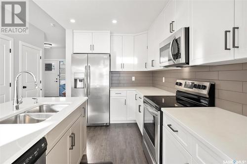 352 Brighton Gate, Saskatoon, SK - Indoor Photo Showing Kitchen With Double Sink With Upgraded Kitchen