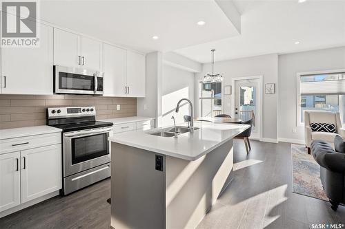 352 Brighton Gate, Saskatoon, SK - Indoor Photo Showing Kitchen With Double Sink With Upgraded Kitchen