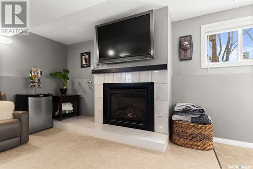 1110 Flexman Crescent N, Regina, SK - Indoor Photo Showing Living Room With Fireplace