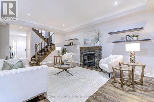 23 Blackburn Lane, Hamilton (Villages Of Glancaster), ON - Indoor Photo Showing Living Room With Fireplace