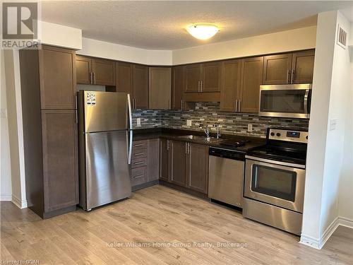 81W - 81 Westminster Crescent, Centre Wellington (Fergus), ON - Indoor Photo Showing Kitchen With Double Sink