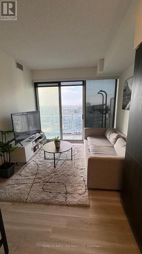 3907 - 17 Bathurst Street N, Toronto, ON - Indoor Photo Showing Living Room