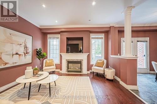 48 - 100 Elgin Mills Road W, Richmond Hill, ON - Indoor Photo Showing Living Room With Fireplace